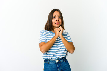 Young mixed race woman scared and afraid.