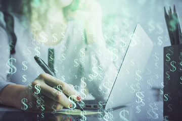 Double exposure of woman hands typing on computer and financial graph hologram drawing. Stock market analysis concept.
