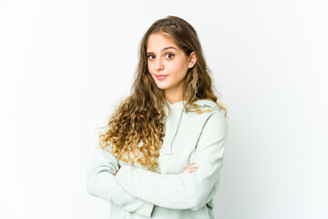 Young caucasian woman unhappy looking in camera with sarcastic expression.