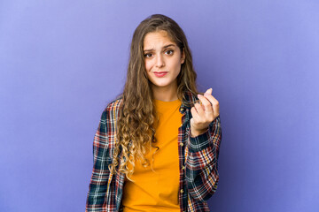 Young caucasian cute woman showing that she has no money.