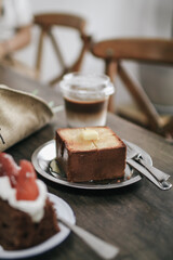 French bread toasted butter on the plate with coffee for breakfast with vintage knife or brunch. 