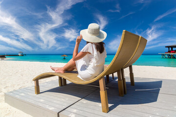 Woman lying in sunbed