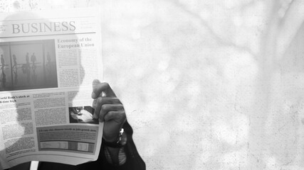 Man reading a business newspaper