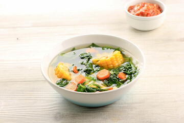 Sayur Bening Bayam is Daily Menu in Indonesian family, made from Spinach, Carrot, and Corn. Spiced with Garlic  and Salt. Served with Various Side Dish like Tofu or Fried Salted Fish and Sambal.