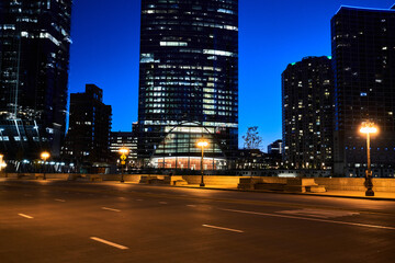 Scenic Sunset View of City of Chicago Business District with blue skies during the Golden Hour; Wacker Drive 