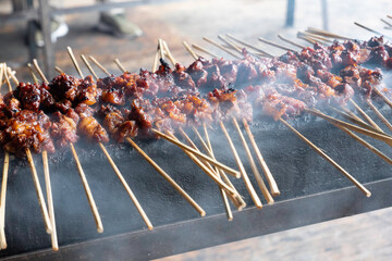 One of the typically Indonesian foods is satay or sate. This food is made from beef or mutton or chicken which is grilled over smoky coals then served with peanut sauce and soy sauce.