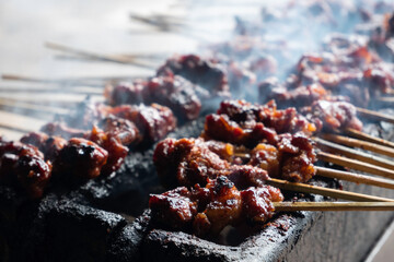 One of the typically Indonesian foods is satay or sate. This food is made from beef or mutton or chicken which is grilled over smoky coals then served with peanut sauce and soy sauce.