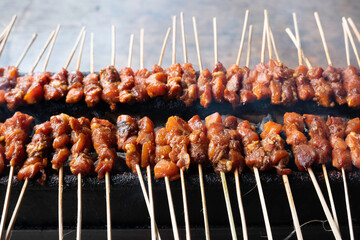 One of the typically Indonesian foods is satay or sate. This food is made from beef or mutton or chicken which is grilled over smoky coals then served with peanut sauce and soy sauce.
