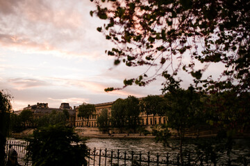 Sunset View Through Trees of Sienne River in Paris