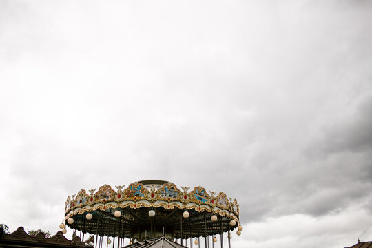 View of Top of Carousel in Paris on Cloudy Day