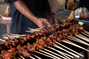 One of the typically Indonesian foods is satay or sate. This food is made from beef or mutton or chicken which is grilled over smoky coals then served with peanut sauce and soy sauce.