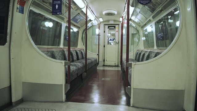 Empty Seats In London Underground Tube Train Carriage In Covid-19 Coronavirus Lockdown Pandemic In England, UK Showing No People, Quiet And Deserted