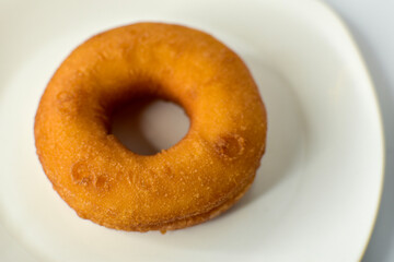 Obraz na płótnie Canvas donut on plate