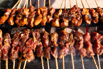 One of the typically Indonesian foods is satay or sate. This food is made from beef or mutton or chicken which is grilled over smoky coals then served with peanut sauce and soy sauce.