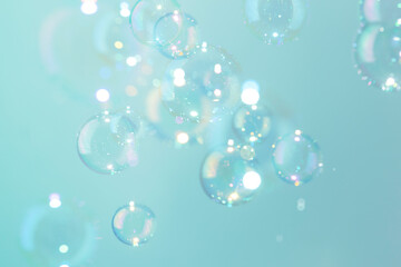Beautiful shiny transparent soap bubbles float texture background. freshness natural summer background.