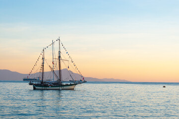 Fototapeta na wymiar a traditional Portuguese ship was docking at Timor Sea, Timor Leste