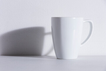 empty white mug with shadow
