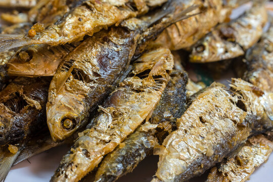 Closeup of deep fried sardines, locally known as Salinyasi. It is a popular food item in the Philippines.
