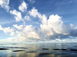 Beautiful Colorful Ocean Beach and blue sky as the background in Thailand.