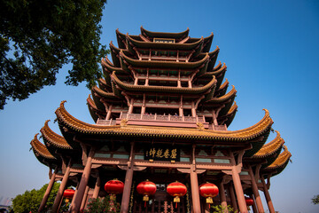 Yellow Crane Tower against blue sky in Snake Hill, Wuhan, China. The three Chinese characters mean "yellow crane tower".