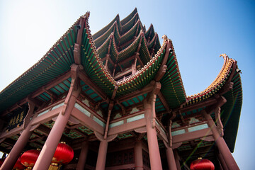 Yellow Crane Tower against blue sky in Snake Hill, Wuhan, China. The three Chinese characters mean "yellow crane tower".