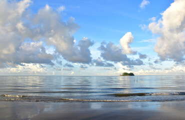 Obraz na płótnie Canvas Beautiful Colorful Ocean Beach and blue sky as the background in Thailand.