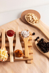 Spoons with different natural ingredients
