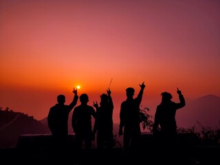 Fototapeta na wymiar silhouettes of people at sunset