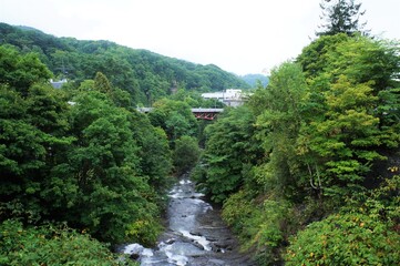 Fototapeta na wymiar 志幌加別川と夕張本町に架かる橋