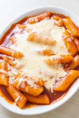 Korean rice cake in spicy Korean sauce with cheese, Cheese Tokpokki, Tteokbokki with Cheese