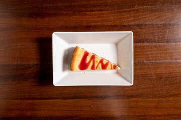 Strawberry Drizzle New York Style Cheesecake Plated Top View