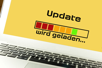 Computer und Ladebalken für Update