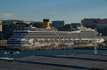 Modern cruise ship liner or cruiseship maintenance repair work inside dry dock shipyard in...