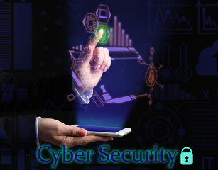 Businesswoman with mobile phone using software for data protection on dark background