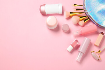 Travel cosmetics on color background