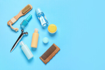 Travel cosmetics kit on color background