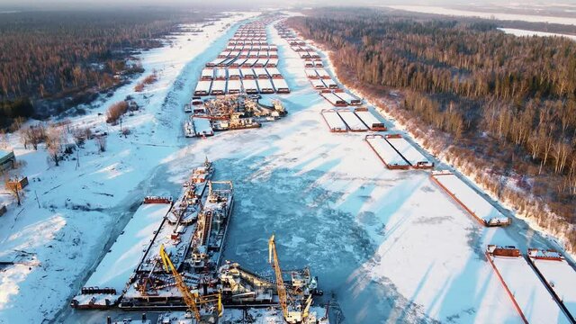 Winter parking of barges and ships in Siberia