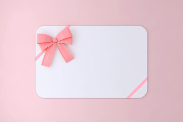 Blank white gift card with pink ribbon bow isolated on pink pastel color background with shadow minimal concept 3D rendering.
