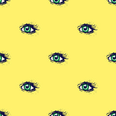Seamless pattern with hand drawn green eyes on yellow background, vector illustration