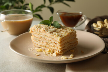 Concept of tasty lunch with plate of Napoleon cake
