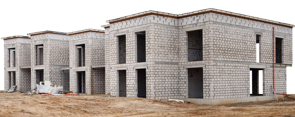 The building of unfinished long rural home from concrete bricks isolated