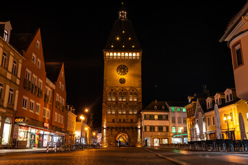 Fototapeta na wymiar The Old Gate Altpoertel in Speyer, Germany at night. The medieval city gate