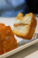 Classic dessert in Hong Kong tea restaurant, deep-fried western toast with condensed milk and peanut sauce