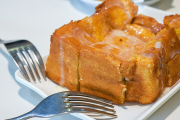 Classic dessert in Hong Kong tea restaurant, deep-fried western toast with condensed milk and peanut sauce
