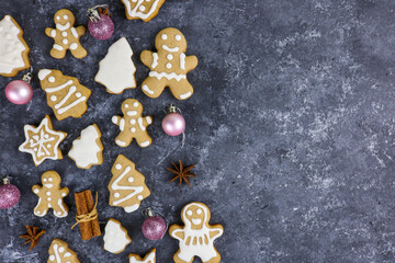 gingerbread with cinnamon on a dark background