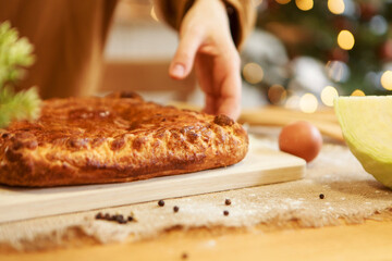 New Year's, Christmas culinary composition from food of generic background, intentionally blurred post production. cake with apples for the new year's table. Bokeh as background.