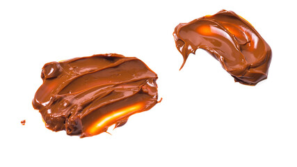 Melted tasty caramel splashes isolated on white background.