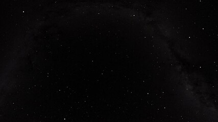 Flying through the stars against the backdrop of a beautiful galaxy, seamless