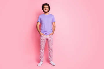 Full length photo of handsome bristled man arms pockets wear violet shirt trousers footwear...