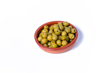 Olives stuffed with anchovies in a ceramic bowl and white background